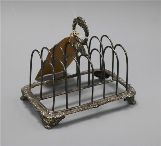 A late George III silver six bar toast rack, London, 1817 (a.f), gross 9.5 oz.